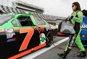 DAYTONA BEACH, FL - FEBRUARY 05:  Danica Patrick, driver of the #7 GoDaddy.com Chevrolet, walks to her car during qualifying for the ARCA Racing Series Lucas Oil Slick Mist 200 at Daytona International Speedway on February 5, 2010 in Daytona Beach, Florida.  (Photo by Todd Warshaw/Getty Images)