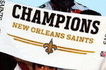 NEW ORLEANS - FEBRUARY 09:  Nick Leckey #60 and Quarterback Drew Brees #9 of the New Orleans Saints celebrate as they parade though the city after winning Super Bowl XLIV on February 9, 2010 in New Orleans, Louisiana.  (Photo by Sean Gardner/Getty Images)
