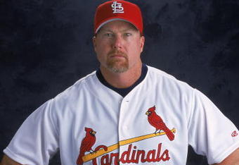 26 Feb 2001: Mark McGwire #25 of the St. Louis Cardinals poses for a studio portrait during Spring Training at Roger Dean Stadium in Jupiter, Florida. According to reports January 11, 2010, McGwire has admitted to steroid use during while playing Major League baseball and when he broke the home run record.  (Photo by Andy Lyons/Getty Images)