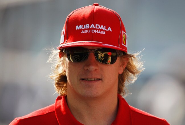 ABU DHABI, UNITED ARAB EMIRATES - NOVEMBER 01:  Kimi Raikkonen of Finland and Ferrari attends the drivers parade before the Abu Dhabi Formula One Grand Prix at the Yas Marina Circuit on November 1, 2009 in Abu Dhabi, United Arab Emirates.  (Photo by Mark Thompson/Getty Images)