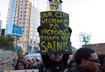 NEW ORLEANS - FEBRUARY 09: Dedicated New Orleans Saints fans fill the streets and greet the team during the New Orleans Saints Super Bowl XLIV Victory Parade on February 9, 2010 in New Orleans, Louisiana. (Photo by Skip Bolen/Getty Images)