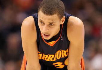 PHOENIX - JANUARY 23:  Stephen Curry #30 of the Golden State Warriors in action during the NBA game against the Phoenix Suns at US Airways Center on January 23, 2010 in Phoenix, Arizona. The Suns defeated the Warriors 112-103.  NOTE TO USER: User expressly acknowledges and agrees that, by downloading and or using this photograph, User is consenting to the terms and conditions of the Getty Images License Agreement.  (Photo by Christian Petersen/Getty Images)