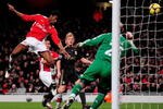 LONDON, ENGLAND - FEBRUARY 10:  Abou Diaby of Arsenal heads the first goal of the game during the Barclays Premier League match between Arsenal and Liverpool at Emirates Stadium on February 10, 2010 in London, England.  (Photo by Mike Hewitt/Getty Images)