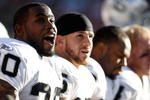 DENVER - DECEMBER 20:  Darren McFadden #20 of the Oakland Raiders reacts on the bench during the first half against the Denver Broncos at Invesco Field at Mile High on December 20, 2009 in Denver, Colorado. The Raiders defeated the Broncos 20-19.  (Photo by Jeff Gross/Getty Images)