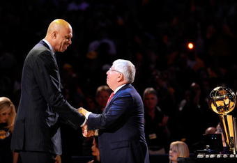 LOS ANGELES, CA - OCTOBER 27:  Assistant coach Kareem Abdul-Jabbar (L) of the Los Angeles Lakers receives his 2009 NBA Championship ring from NBA Commissioner David Stern before the season opening game against the Los Angeles Clippers at Staples Center on October 27, 2009 in Los Angeles, California.  NOTE TO USER: User expressly acknowledges and agrees that, by downloading and or using this photograph, User is consenting to the terms and conditions of the Getty Images License Agreement. Mandatory Copyright Notice: Copyright 2009 NBAE  (Photo by Kevork Djansezian/Getty Images)