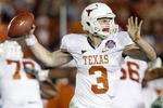 PASADENA, CA - JANUARY 07:  Quarterback Garrett Gilbert #3 of the Texas Longhorns drops back to pass against the Alabama Crimson Tide during the Citi BCS National Championship game at the Rose Bowl on January 7, 2010 in Pasadena, California.  (Photo by Jeff Gross/Getty Images)