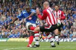 SOUTHAMPTON, ENGLAND -  APRIL 24:  Lomana LuaLua of Southampton curls in his second goal during the Barclays Premiership match between Portsmouth and Southampton at Fratton Park on April 24, 2005  in Portsmouth, England. (Photo by Mike Hewitt/Getty Images)