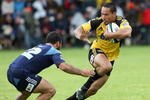 MANGATAINOKA, NEW ZEALAND - JANUARY 23:  Hosea Gear of the Hurricanes fends off Rene Ranger of the Blues during a Super 14 Trial match between the Hurricanes and the Blues at Mangatainoka Rugby grounds on January 23, 2010 in Mangatainoka, New Zealand.  (Photo by Marty Melville/Getty Images)