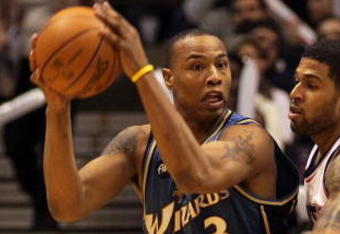 EAST RUTHERFORD, NJ - JANUARY 29:  Caron Butler #3 of the Washington Wizards controls the ball against Chris Douglas-Roberts #17 of the New Jersey Nets at the Izod Center on January 29, 2010 in East Rutherford, New Jersey. The Wizards defeated the Nets 81-79.NOTE TO USER: User expressly acknowledges and agrees that, by downloading and or using this photograph, User is consenting to the terms and conditions of the Getty Images License Agreement.  (Photo by Jim McIsaac/Getty Images)