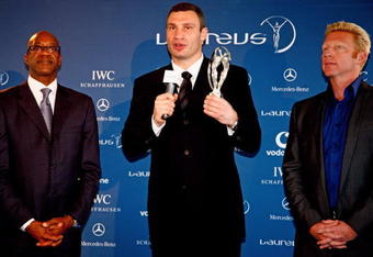 DORTMUND, GERMANY - JUNE 19:  WBC World Champion Vitali Klitschko (C) poses with Academy Chairman Ed Moses (L) and Boris Becker (R) after receiving the Laureus World Comeback of the year award during a ceremony and press conference held at the B1 on June 19, 2009 in Dortmund, Germany.  (Photo by Friedemann Vogel/Getty Images for Laureus)