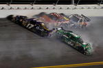 DAYTONA BEACH, FL - FEBRUARY 06:  Carl Edwards, driver of the #99 Scotts Ford and Matt Kenseth, driver of the #17 Crown Royal Ford, lose control of their cars after crashing during the Budweiser Shootout at Daytona International Speedway on February 6, 2010 in Daytona Beach, Florida.  (Photo by John Harrelson/Getty Images for NASCAR)
