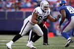 EAST RUTHERFORD, NJ - OCTOBER 11:  Richard Seymour #92 of the Oakland Raiders defends against the New York Giants on October 11, 2009 at Giants Stadium in East Rutherford, New Jersey. The Giants defeated the Raiders 44-7.  (Photo by Jim McIsaac/Getty Images)