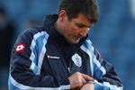 LONDON, ENGLAND - DECEMBER 19:  Mick Harford of QPR checks the time during the Coca Cola Championship match between Queens Park Rangers and Sheffield United at Loftus Road Stadium on December 19, 2009 in London, England.  (Photo by Ian Walton/Getty Images)
