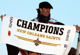 NEW ORLEANS - FEBRUARY 09:  Nick Leckey #60 and Quarterback Drew Brees #9 of the New Orleans Saints celebrate as they parade though the city after winning Super Bowl XLIV on February 9, 2010 in New Orleans, Louisiana.  (Photo by Sean Gardner/Getty Images)