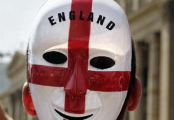 STUTTGART, GERMANY - JUNE 25: An England supporter wears a Flag of St George face mask on June 25, 2006 in Stuttgart, Germany. England will face Ecuador in their first knock-out round today in Stuttgart.  (Photo by Peter Macdiarmid/Getty Images)