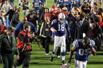MIAMI GARDENS, FL - FEBRUARY 07:  Peyton Manning #18 of the Indianapolis Colts walks off the field after being defeated by the New Orleans Saints during Super Bowl XLIV on February 7, 2010 at Sun Life Stadium in Miami Gardens, Florida.  (Photo by Jed Jacobsohn/Getty Images)