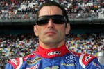 DAYTONA BEACH, FL - FEBRUARY 11:  Max Papis, driver of the #13 GEICO Toyota, stands on the grid during the first NASCAR Sprint Cup Series Gatorade Duel at Daytona International Speedway on February 11, 2010 in Daytona Beach, Florida.  (Photo by Jerry Markland/Getty Images for NASCAR)