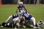 MIAMI GARDENS, FL - FEBRUARY 07:  Chris Reis #39 and Roman Harper #41 of the New Orleans Saints fight for the ball with Cody Glenn and Hank Baskett of the Indianapolis Colts after a onside kick to start the second half with during Super Bowl XLIV on February 7, 2010 at Sun Life Stadium in Miami Gardens, Florida.  (Photo by Ezra Shaw/Getty Images)