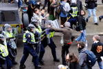 VANCOUVER, BC - FEBRUARY 13:  Demonstraters and Vancouver Police clash on Robson St. in downtwon Vancouver during a protest against the Vancouver 2010 Winter Olympics on February 13, 2010 in Vancouver, Canada.  (Photo by Kevork Djansezian/Getty Images)