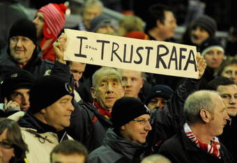 LIVERPOOL, ENGLAND - JANUARY 20:  A Liverpool fan shows his support for Liverpool Manager Rafael Benitez during the Barclays Premier League match between Liverpool and Tottenham Hotspur at Anfield on January 20, 2010 in Liverpool, England.  (Photo by Michael Regan/Getty Images)