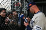 BEIJING - MARCH 16:  Kevin Kouzmanoff #5 of the San Diego Padres signs autographs for fans after  the game against the Los Angeles Dodgers at Beijing's Wukesong Stadium on March 16, 2008 in Beijing, China. The San Diego Padres will face the Los Angeles Dodgers in the first-ever Major League baseball games played in China.  (Photo by Guang Niu/Getty Images)