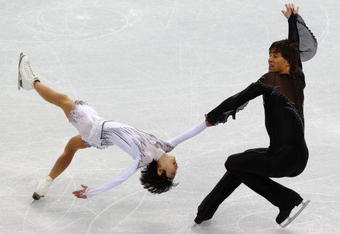 VANCOUVER, BC - FEBRUARY 14:  Yuko Kavaguti and Alexander Smirnov of Russia compete in the figure skating pairs short program on day 3 of the Vancouver 2010 Winter Olympics at Pacific Coliseum on February 14, 2010 in Vancouver, Canada.  (Photo by Alex Livesey/Getty Images)