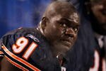 CHICAGO - DECEMBER 28: Tommie Harris #91 of the Chicago Bears rests on the bench during a game against the Minnesota Vikings at Soldier Field on December 28, 2009 in Chicago, Illinois. The Bears defeated the Vikings 36-30 in overtime. (Photo by Jonathan Daniel/Getty Images)