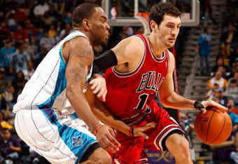 NEW ORLEANS - JANUARY 29:  Kirk Hinrich #12 of the Chicago Bulls drives the ball around Marcus Thornton #5 of the New Orleans Hornets at the New Orleans Arena on January 29, 2010 in New Orleans, Louisiana.   NOTE TO USER: User expressly acknowledges and agrees that, by downloading and/or using this Photograph, User is consenting to the terms and conditions of the Getty Images License Agreement.  (Photo by Chris Graythen/Getty Images)