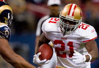 ST. LOUIS - JANUARY 3: Frank Gore #21 of the San Francisco 49ers rushes against the St. Louis Rams at the Edward Jones Dome on January 3, 2010 in St. Louis, Missouri.  The 49ers beat the Rams 28-6.  (Photo by Dilip Vishwanat/Getty Images)