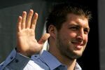 DAYTONA BEACH, FL - FEBRUARY 11:  Quaterback Tim Tebow #7 of the Florida Gators stands onstage before the first NASCAR Sprint Cup Series Gatorade Duel at Daytona International Speedway on February 11, 2010 in Daytona Beach, Florida.  (Photo by Jerry Markland/Getty Images for NASCAR)