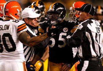 PITTSBURGH - DECEMBER 07:  Joey Porter #55 of the Pittsburgh Steelers and Kellen Winslow #80 of the Cleveland Browns are seperated by teammates and officials late in the fourth quarter December 7, 2006 at Heinz Field in Pittsburgh, Pennsylvania.  (Photo by Gregory Shamus/Getty Images)