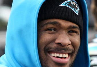 CHARLOTTE, NC - JANUARY 03:  DeAngelo Williams #34 of the Carolina Panthers smiles on the bench during their game against the New Orleans Saints at Bank of America Stadium on January 3, 2010 in Charlotte, North Carolina.  (Photo by Streeter Lecka/Getty Images)