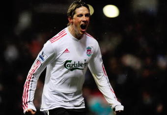 BIRMINGHAM, ENGLAND - DECEMBER 29:  Fernando Torres of Liverpool celebrates scoring the opening goal during the Barclays Premier League match between Aston Villa and Liverpool at Villa Park on December 29, 2009 in Birmingham, England.  (Photo by Jamie McDonald/Getty Images)
