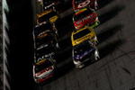 DAYTONA BEACH, FL - FEBRUARY 14: Scott Speed in his #82 Red Bull Toyota leads Greg Bifle in his #16 3M Ford during the NASCAR Sprint Cup Series Daytona 500 at Daytona International Speedway on February 14, 2010 in Daytona Beach, Florida.  (Photo by Jonathan Ferrey/Getty Images for NASCAR)