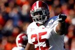 AUBURN, AL - NOVEMBER 27:  Rolando McClain #25 of the Alabama Crimson Tide against the Auburn Tigers at Jordan-Hare Stadium on November 27, 2009 in Auburn, Alabama.  (Photo by Kevin C. Cox/Getty Images)