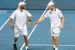 BRISBANE, AUSTRALIA - JANUARY 03:  James Blake and Andy Roddick of the USA celebrate after winning a point during their first round doubles match against Travis Parrott of the USA and Jaroslav Levinsky of the Czech Republic during day one of the Brisbane International 2010 at the Queensland Tennis Centre on January 3, 2010 in Brisbane, Australia.  (Photo by Mark Kolbe/Getty Images)