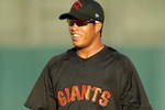 PHOENIX - OCTOBER 16:  San Francisco Giants prospect Thomas Neal, playing for the Scottsdale Scorpions, warms up before the Arizona Fall League game against the Phoenix Desert Dogs at Phoenix Municipal Stadium on October 16, 2009 in Phoenix, Arizona  (Photo by Christian Petersen/Getty Images)