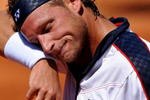 BARCELONA, SPAIN - APRIL 23:  David Nalbandian of Argentina wipes his face during his match against Nicolas Almagro of Spain on day four of the ATP 500 World Tour Barcelona Open Banco Sabadell 2009 tennis tournament at the Real Club de Tenis on April 23, 2009 in Barcelona, Spain. Nalbandian won the match in two sets, 6-3 and 6-4, but has pulled out of tomorows semi-final match against Rafael Nadal due to an injury.  (Photo by Jasper Juinen/Getty Images)