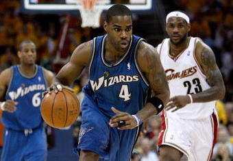 CLEVELAND - APRIL 30:  Antawn Jamison #4 of the Washington Wizards brings the ball upcourt followed by LeBron James #23 of the Cleveland Cavaliers in Game Five of the Eastern Conference Quarterfinals during the 2008 NBA Playoffs at Quicken Loans Arena on April 30, 2008 in Cleveland, Ohio.  The Wizards won 88-87.  NOTE TO USER: User expressly acknowledges and agrees that, by downloading and or using this photograph, User is consenting to the terms and conditions of the Getty Images License Agreement.  (Photo by Gregory Shamus/Getty Images) 