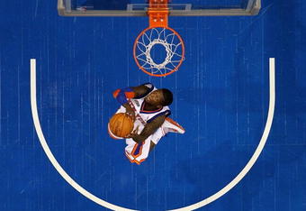 DALLAS - FEBRUARY 13:  Nate Robinson #2 of the New York Knicks attempts a dunk during the Sprite Slam Dunk Contest on All-Star Saturday Night, part of 2010 NBA All-Star Weekend at American Airlines Center on February 13, 2010 in Dallas, Texas. NOTE TO USER: User expressly acknowledges and agrees that, by downloading and or using this photograph, User is consenting to the terms and conditions of the Getty Images License Agreement.  (Photo by Ronald Martinez/Getty Images)