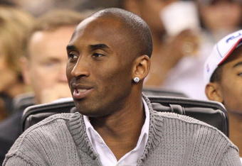 ARLINGTON, TX - FEBRUARY 14:  An injured Kobe Bryant sits on on the bench during the the NBA All-Star Game, part of 2010 NBA All-Star Weekend at Cowboys Stadium on February 14, 2010 in Arlington, Texas. NOTE TO USER: User expressly acknowledges and agrees that, by downloading and or using this photograph, User is consenting to the terms and conditions of the Getty Images License Agreement.  (Photo by Jed Jacobsohn/Getty Images)