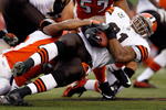 CINCINNATI - NOVEMBER 29:  Jamal Lewis #31 of the Cleveland Browns is tackled by Chris Crocker #42 of the Cincinnati Bengals during the NFL game at Paul Brown Stadium on November 29, 2009 in Cincinnati, Ohio.  (Photo by Andy Lyons/Getty Images)