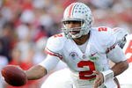 PASADENA, CA - JANUARY 01:  Quarterback Terrelle Pryor #2 of the Ohio State Buckeyes hands the ball off against the Oregon Ducks during the 96th Rose Bowl game on January 1, 2010 in Pasadena, California.  (Photo by Kevork Djansezian/Getty Images)