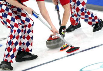 VANCOUVER, BC - FEBRUARY 18:  A detail of the pants of team members from Norway as they sweep during the men's curling round robin game against Switzerland on day 7 of the Vancouver 2010 Winter Olympics at Vancouver Olympic Centre on February 18, 2010 in Vancouver, Canada.  (Photo by Jamie Squire/Getty Images)