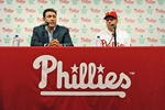 PHILADELPHIA - DECEMBER 16: Pitcher Roy Halladay (R) of the Philadelphia Phillies and senior vice president and general manager Ruben Amaro, Jr. answer questions from the media on December 16, 2009 at Citizens Bank Park in Philadelphia, Pennsylvania. (Photo by Drew Hallowell/Getty Images)