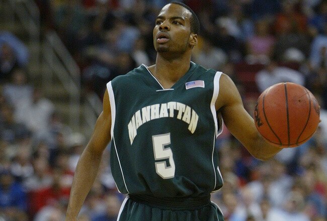 RALEIGH, NC - MARCH 20:  Jason Wingate #5 of the Manhattan Jaspers moves the ball during the second round game of the NCAA Division I Men's Basketball Tournament against the Wake Forest Demon Deacons at the RBC Center on March 20, 2004 in Raleigh, North Carolina. The Demon Deacons won 84-80.  (Photo by Ezra Shaw/Getty Images)