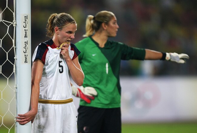 BEIJING - AUGUST 21:  Lindsay Tarpley #5 of United States awaits a corner as goalkeeper, Hope Solo #1 organises her defence during the Women's Football Gold Medal match between Brazil and the United States on Day 13 of the Beijing 2008 Olympic Games on August 21, 2008 at Worker's Stadium in Beijing, China.  (Photo by Mike Hewitt/Getty Images)