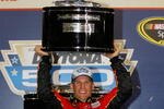 DAYTONA BEACH, FL - FEBRUARY 14:  Jamie McMurray, driver of the #1 Bass Pro Shops/Tracker Boats Chevrolet, celebrates in Victory Lane after winning the NASCAR Sprint Cup Series Daytona 500 at Daytona International Speedway on February 14, 2010 in Daytona Beach, Florida.  (Photo by Jason Smith/Getty Images for NASCAR)