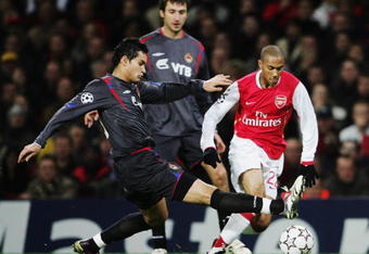 LONDON - NOVEMBER 01:  Dudu (L) of CSKA Moscow tackles Gael Clichy (R) of Arsenal during the UEFA Champions League Group G match between Arsenal and CSKA Moscow at The Emirates Stadium on November 1, 2006 in London, England.  (Photo by Phil Cole/Getty Images)