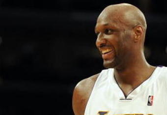 LOS ANGELES, CA - JANUARY 10:  Lamar Odum #7 of the Los Angeles Lakers smiles after a timeout against the Milwaukee Bucks during the game at Staples Center on January 10, 2010 in Los Angeles, California.  NOTE TO USER: User expressly acknowledges and agrees that, by downloading and/or using this Photograph, user is consenting to the terms and conditions of the Getty Images License Agreement.  (Photo by Harry How/Getty Images)